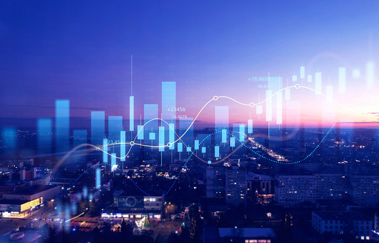 A view of a city at sunset from above with a bar chart on top of the image