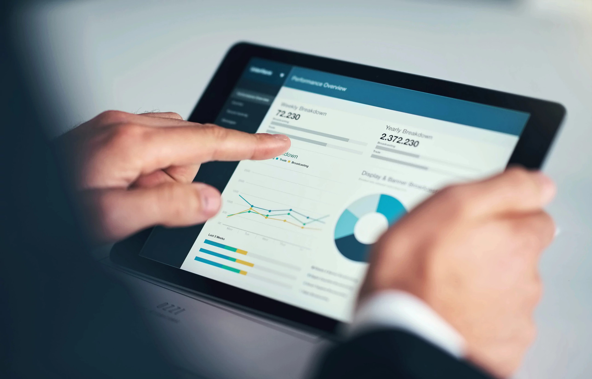 hands-holding-tablet-review-retirement-plan