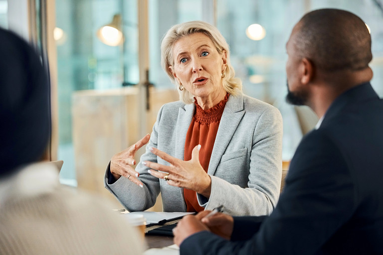business woman discussing with clients